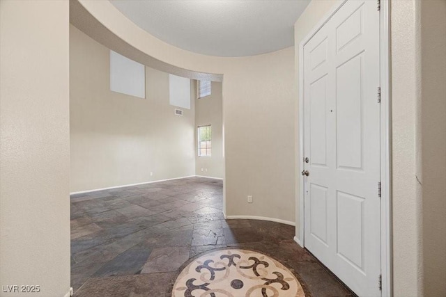 9413 Arcadia Woods Ct, Las Vegas, NV 89149 - entrance foyer featuring stone tile flooring and baseboards