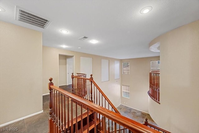 9413 Arcadia Woods Ct, Las Vegas, NV 89149 - hall with an upstairs landing and recessed lighting