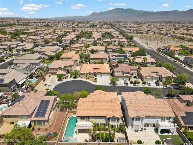 9413 Arcadia Woods Ct, Las Vegas, NV 89149 - aerial view of residential area featuring a mountainous background and a pool