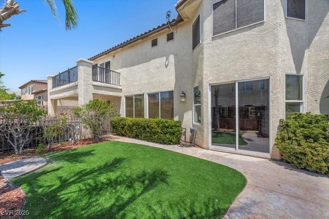 9413 Arcadia Woods Ct, Las Vegas, NV 89149 - back of house with stucco siding and a balcony