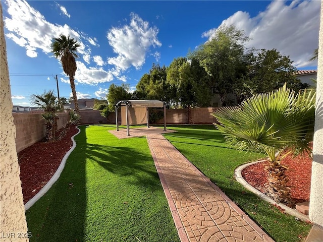 fenced backyard with a pergola