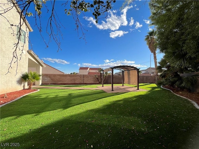 fenced backyard featuring a pergola and a patio