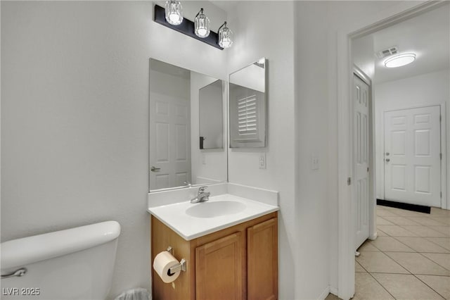 6430 Jackrabbit Run Ave, Las Vegas, NV 89122 - half bath featuring vanity and tile patterned floors