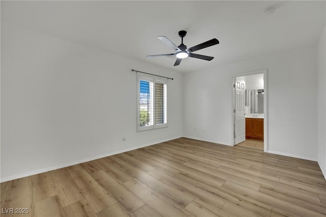 6430 Jackrabbit Run Ave, Las Vegas, NV 89122 - unfurnished bedroom with light wood finished floors, ensuite bathroom, and a ceiling fan