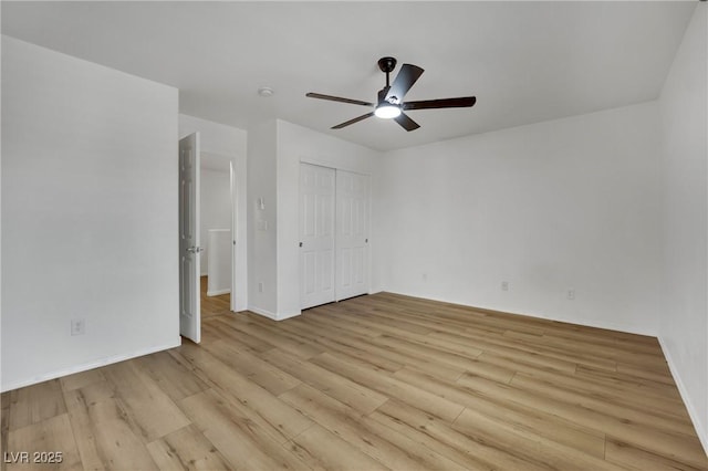 6430 Jackrabbit Run Ave, Las Vegas, NV 89122 - unfurnished bedroom with light wood finished floors, a closet, and a ceiling fan
