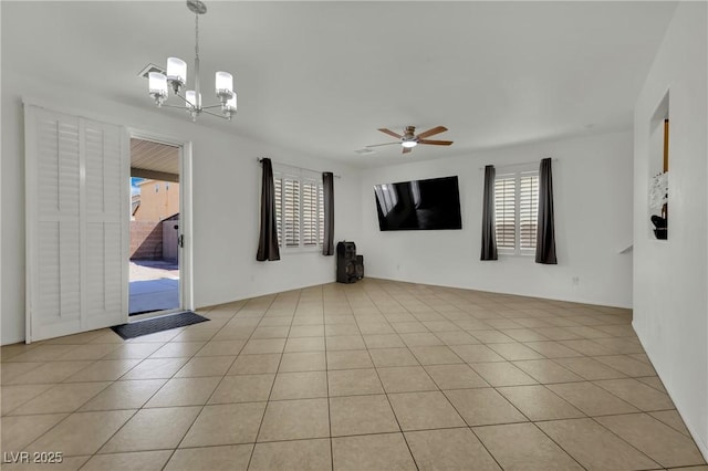 6430 Jackrabbit Run Ave, Las Vegas, NV 89122 - unfurnished room featuring a chandelier, a ceiling fan, and light tile patterned floors