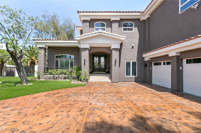 7520 Captains Harbor Dr, Las Vegas, NV 89117 - view of front of home featuring french doors, stucco siding, and a tile roof