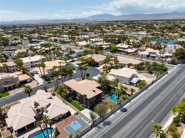 7520 Captains Harbor Dr, Las Vegas, NV 89117 - aerial view of residential area with a mountainous background and a pool area