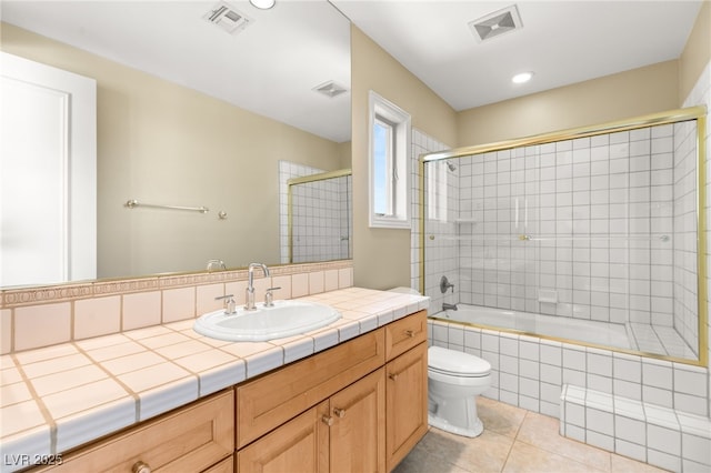 7520 Captains Harbor Dr, Las Vegas, NV 89117 - full bath with tile patterned floors, tiled shower / bath, and vanity