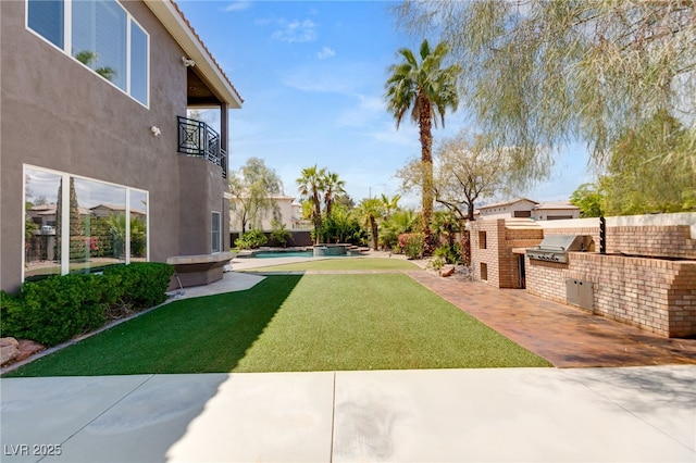 7520 Captains Harbor Dr, Las Vegas, NV 89117 - view of green lawn with exterior kitchen, a patio, an outdoor pool, and a balcony