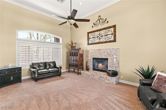 7520 Captains Harbor Dr, Las Vegas, NV 89117 - living room with carpet, ornamental molding, a fireplace, ceiling fan, and recessed lighting