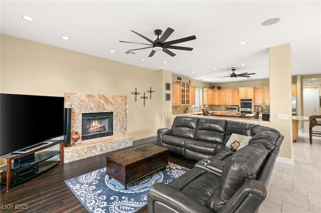 7520 Captains Harbor Dr, Las Vegas, NV 89117 - living room featuring ceiling fan, recessed lighting, and a premium fireplace
