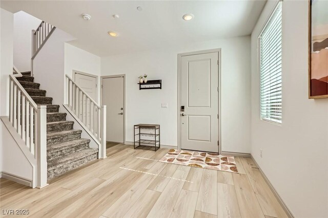 1289 Valencia Cliffs Ave, Henderson, NV 89012 - foyer with stairway, light wood finished floors, healthy amount of natural light, and recessed lighting