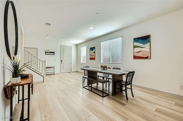 1289 Valencia Cliffs Ave, Henderson, NV 89012 - dining area with stairway, light wood-style flooring, and recessed lighting