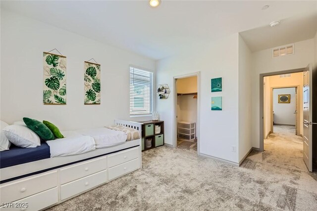 1289 Valencia Cliffs Ave, Henderson, NV 89012 - bedroom with carpet floors and a walk in closet