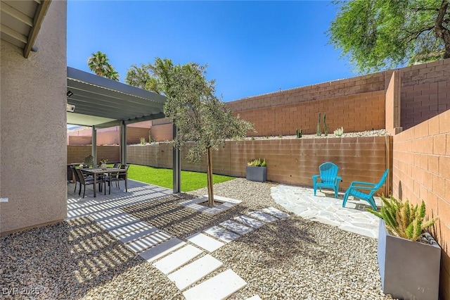 1289 Valencia Cliffs Ave, Henderson, NV 89012 - fenced backyard with a patio