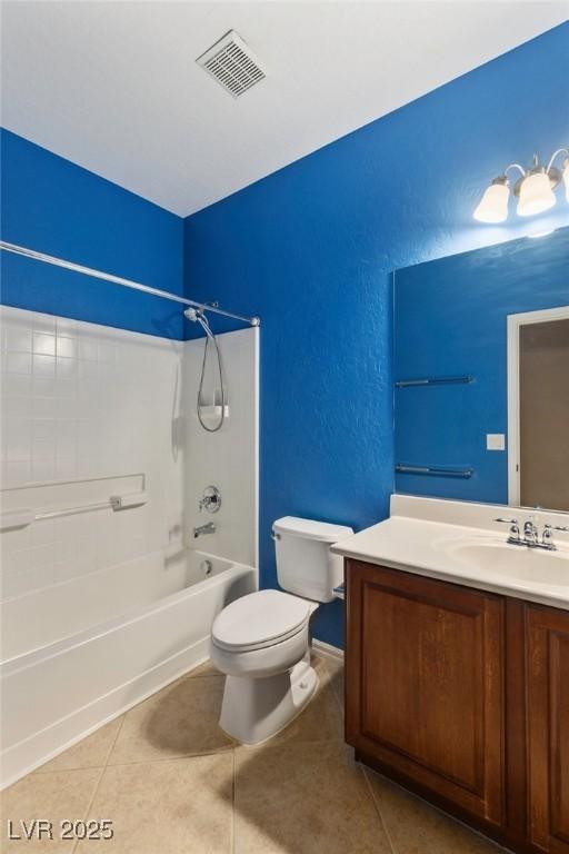 4117 Gliding Gulls Ave, North Las Vegas, NV 89084 - full bathroom featuring vanity, bathing tub / shower combination, tile patterned flooring, and a textured wall