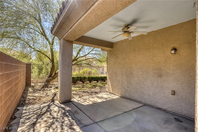 4117 Gliding Gulls Ave, North Las Vegas, NV 89084 - fenced backyard with a ceiling fan and a patio area