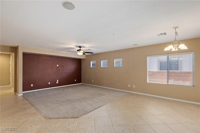 4117 Gliding Gulls Ave, North Las Vegas, NV 89084 - spare room featuring a chandelier, ceiling fan, light tile patterned flooring, and light colored carpet