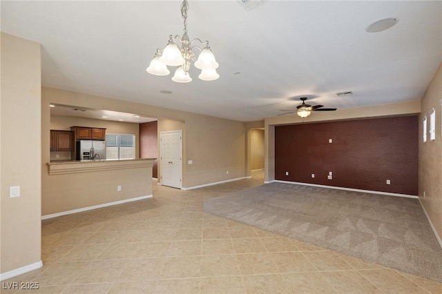 4117 Gliding Gulls Ave, North Las Vegas, NV 89084 - unfurnished living room with a chandelier and a ceiling fan