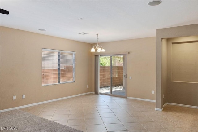4117 Gliding Gulls Ave, North Las Vegas, NV 89084 - spare room featuring a chandelier and light tile patterned floors