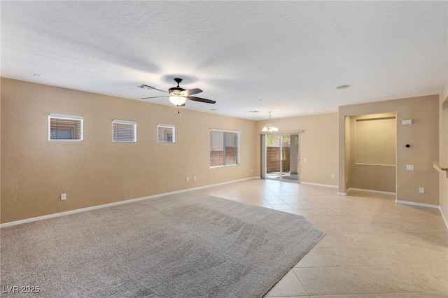 4117 Gliding Gulls Ave, North Las Vegas, NV 89084 - unfurnished room featuring light tile patterned floors, a ceiling fan, and a chandelier
