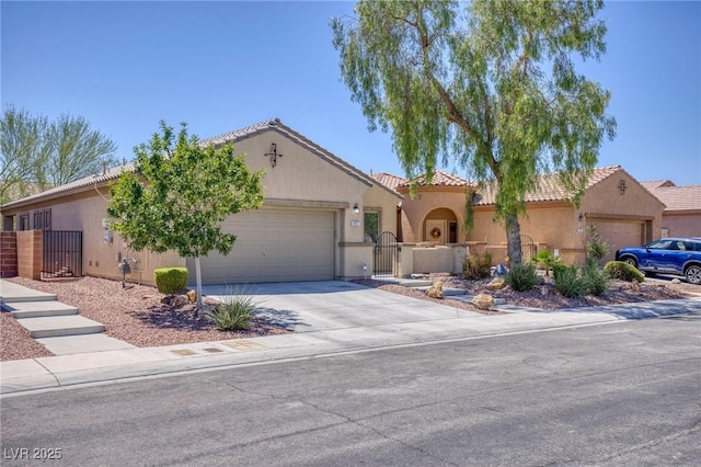 4117 Gliding Gulls Ave, North Las Vegas, NV 89084 - mediterranean / spanish house with an attached garage, a tile roof, stucco siding, driveway, and a gate
