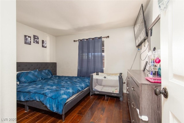 3308 Tabor Ave, North Las Vegas, NV 89030 - bedroom with dark wood finished floors