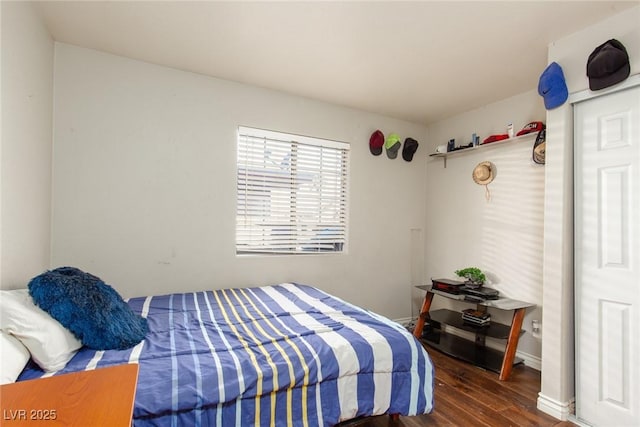 3308 Tabor Ave, North Las Vegas, NV 89030 - bedroom with wood finished floors and baseboards