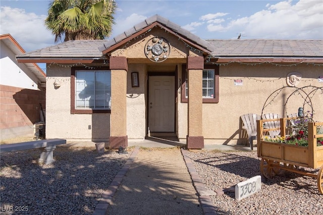 3308 Tabor Ave, North Las Vegas, NV 89030 - entrance to property featuring stucco siding