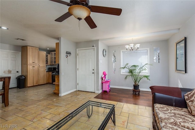 3308 Tabor Ave, North Las Vegas, NV 89030 - living area with a chandelier, a ceiling fan, stone tile flooring, and recessed lighting