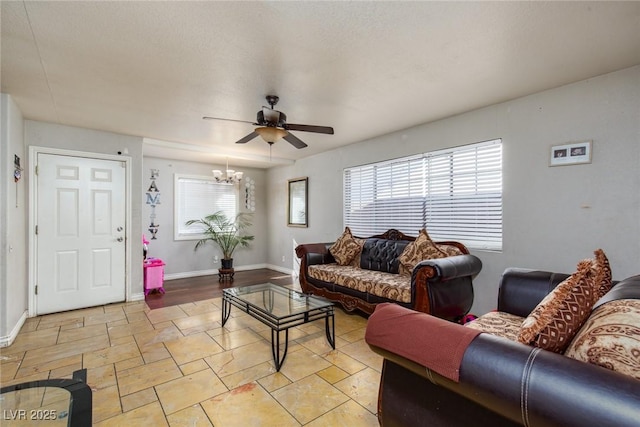 3308 Tabor Ave, North Las Vegas, NV 89030 - living area featuring healthy amount of natural light, a ceiling fan, and a chandelier