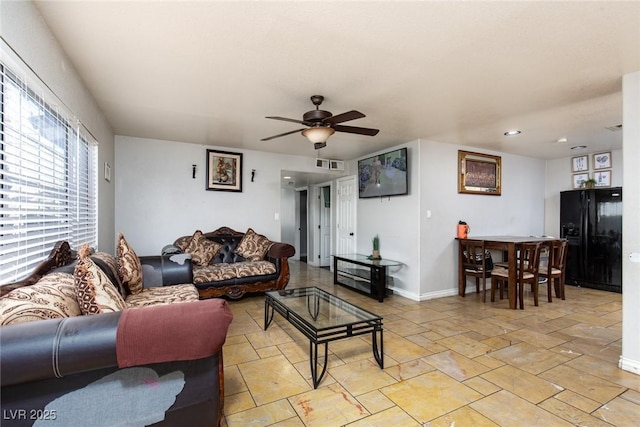 3308 Tabor Ave, North Las Vegas, NV 89030 - living area featuring ceiling fan, light stone finish flooring, and recessed lighting
