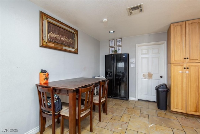 3308 Tabor Ave, North Las Vegas, NV 89030 - dining room with recessed lighting and light stone finish floors
