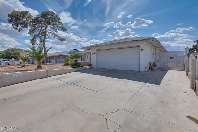 5403 Tamarus St, Las Vegas, NV 89119 - single story home featuring an attached garage, concrete driveway, and stucco siding