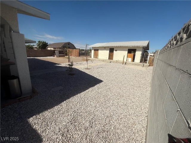 5403 Tamarus St, Las Vegas, NV 89119 - fenced backyard featuring a patio