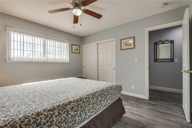 5403 Tamarus St, Las Vegas, NV 89119 - bedroom featuring dark wood-style flooring, a closet, and ceiling fan