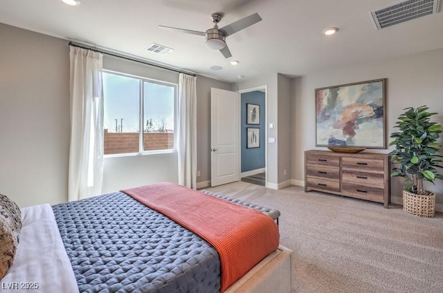 1408 Eva Creek Dr Unit 27, North Las Vegas, NV 89084 - bedroom with light colored carpet, a ceiling fan, and recessed lighting