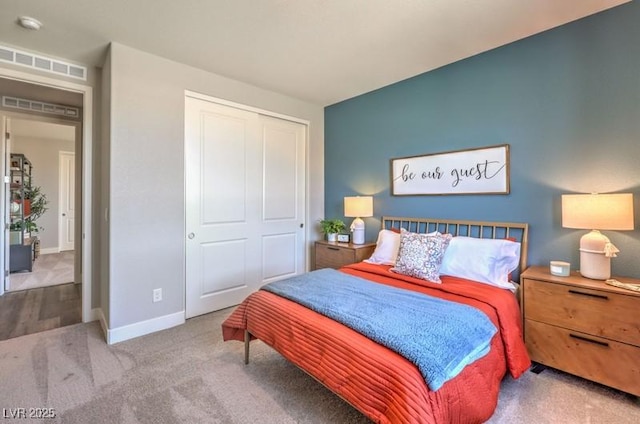 1408 Eva Creek Dr Unit 27, North Las Vegas, NV 89084 - bedroom with a closet and carpet floors
