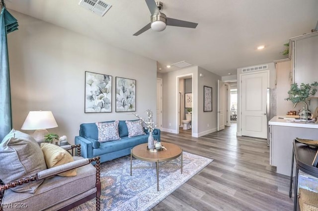 1408 Eva Creek Dr Unit 27, North Las Vegas, NV 89084 - living area featuring ceiling fan, light wood-type flooring, and recessed lighting