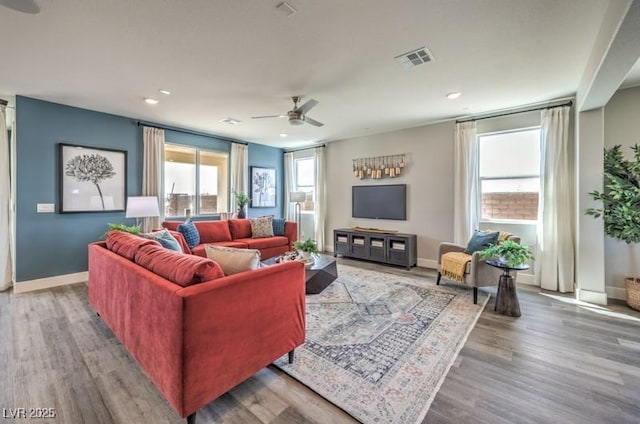 1408 Eva Creek Dr Unit 27, North Las Vegas, NV 89084 - living area featuring a ceiling fan, wood finished floors, and recessed lighting