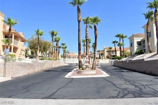 1940 Las Palmas Ln Unit 272, Laughlin, NV 89029 - view of asphalt road with a gate and a residential view