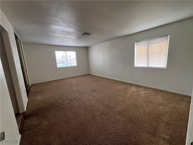 5253 Westwind Rd, Las Vegas, NV 89118 - carpeted spare room featuring a textured ceiling