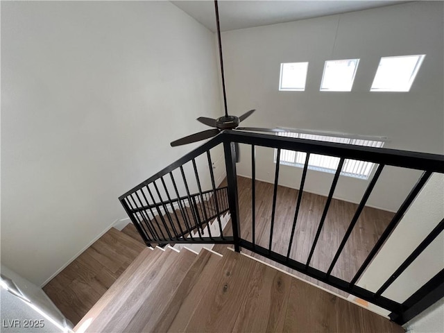 5253 Westwind Rd, Las Vegas, NV 89118 - staircase featuring wood finished floors and ceiling fan
