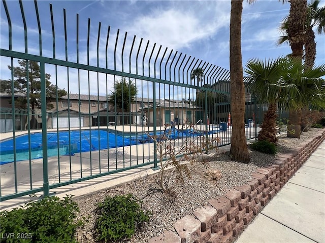 5253 Westwind Rd, Las Vegas, NV 89118 - community pool featuring a patio area