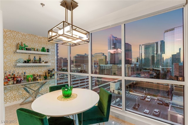 4525 Dean Martin Dr Unit 1007, Las Vegas, NV 89103 - sunroom / solarium with a chandelier and a city view