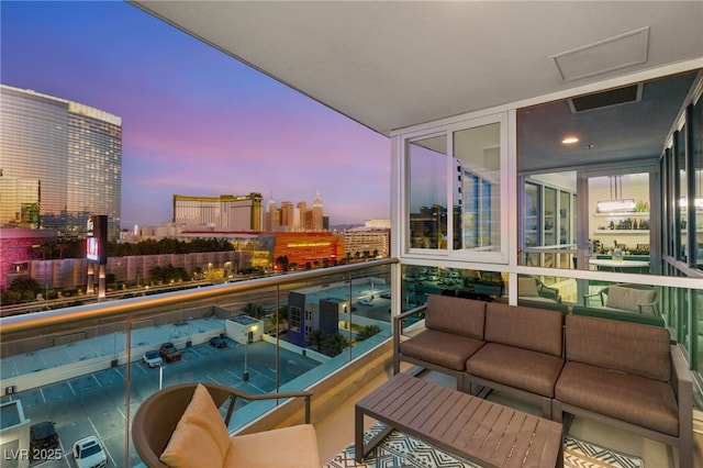 4525 Dean Martin Dr Unit 1007, Las Vegas, NV 89103 - balcony with a city view and an outdoor living space