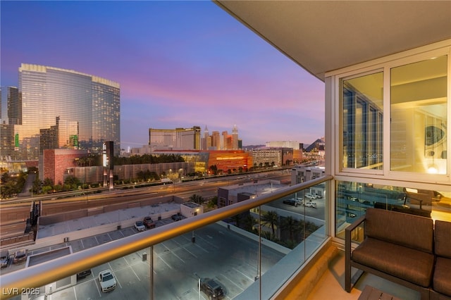 4525 Dean Martin Dr Unit 1007, Las Vegas, NV 89103 - balcony at dusk featuring a view of city