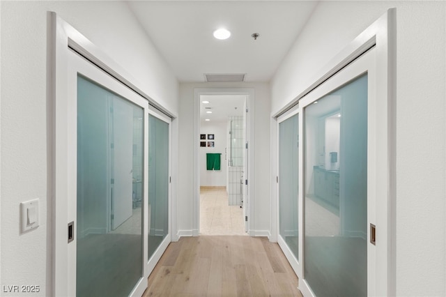 4525 Dean Martin Dr Unit 1007, Las Vegas, NV 89103 - corridor featuring light wood-style flooring and recessed lighting