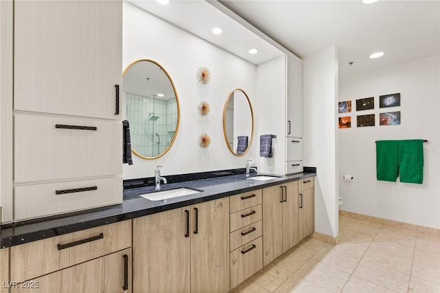 4525 Dean Martin Dr Unit 1007, Las Vegas, NV 89103 - bathroom with double vanity, recessed lighting, tile patterned floors, and a shower